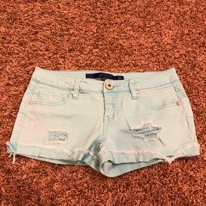 Tiffany blue distressed shorts